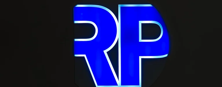 Logo of RP-Technik illuminated with LED